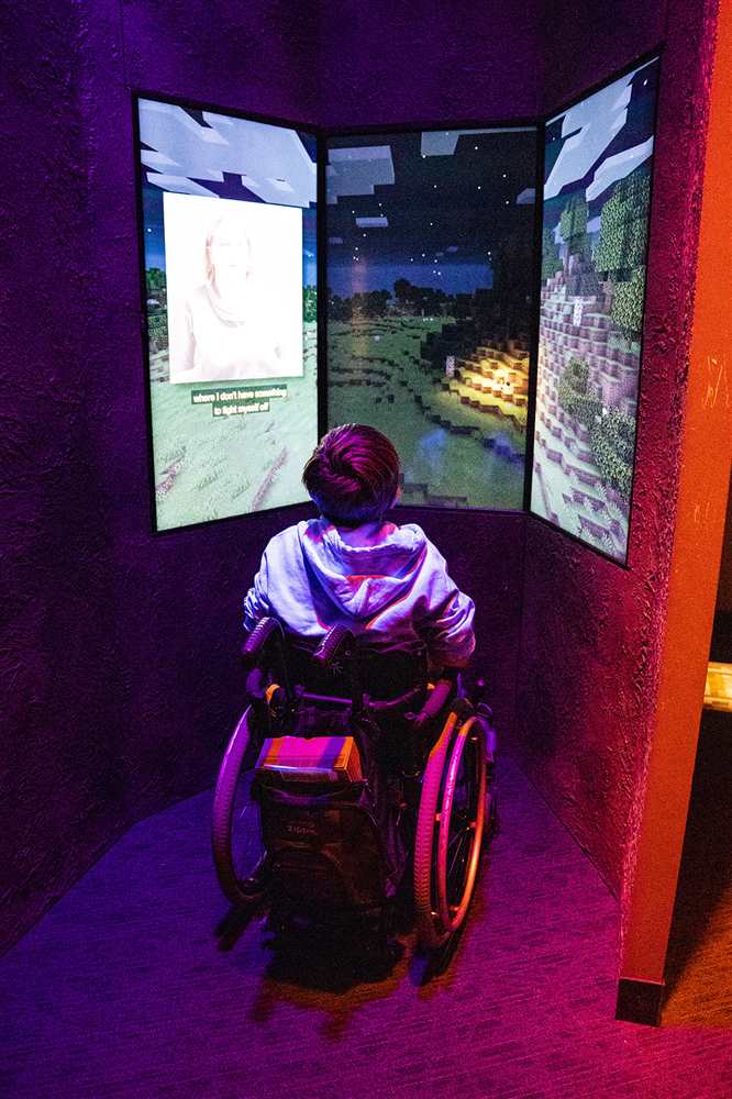 Child viewing Minecraft exhibit at Children's Museum