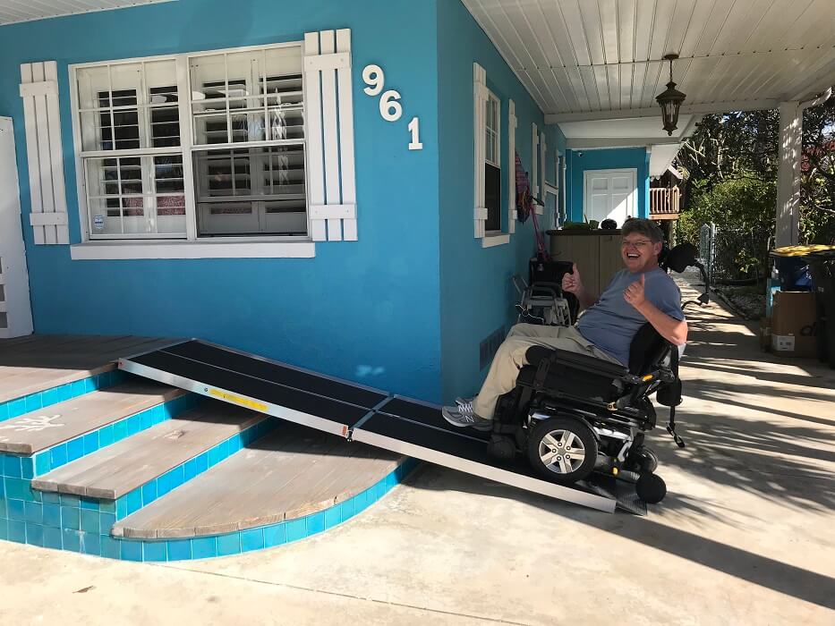 James on his new ramp outside his home