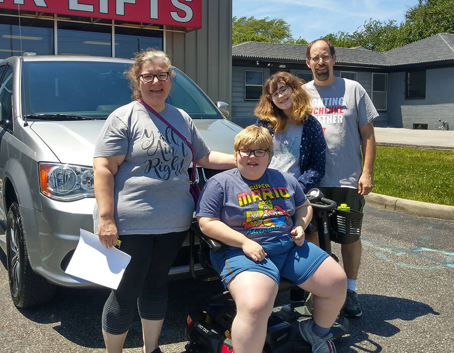 Tom's Family in front of a van